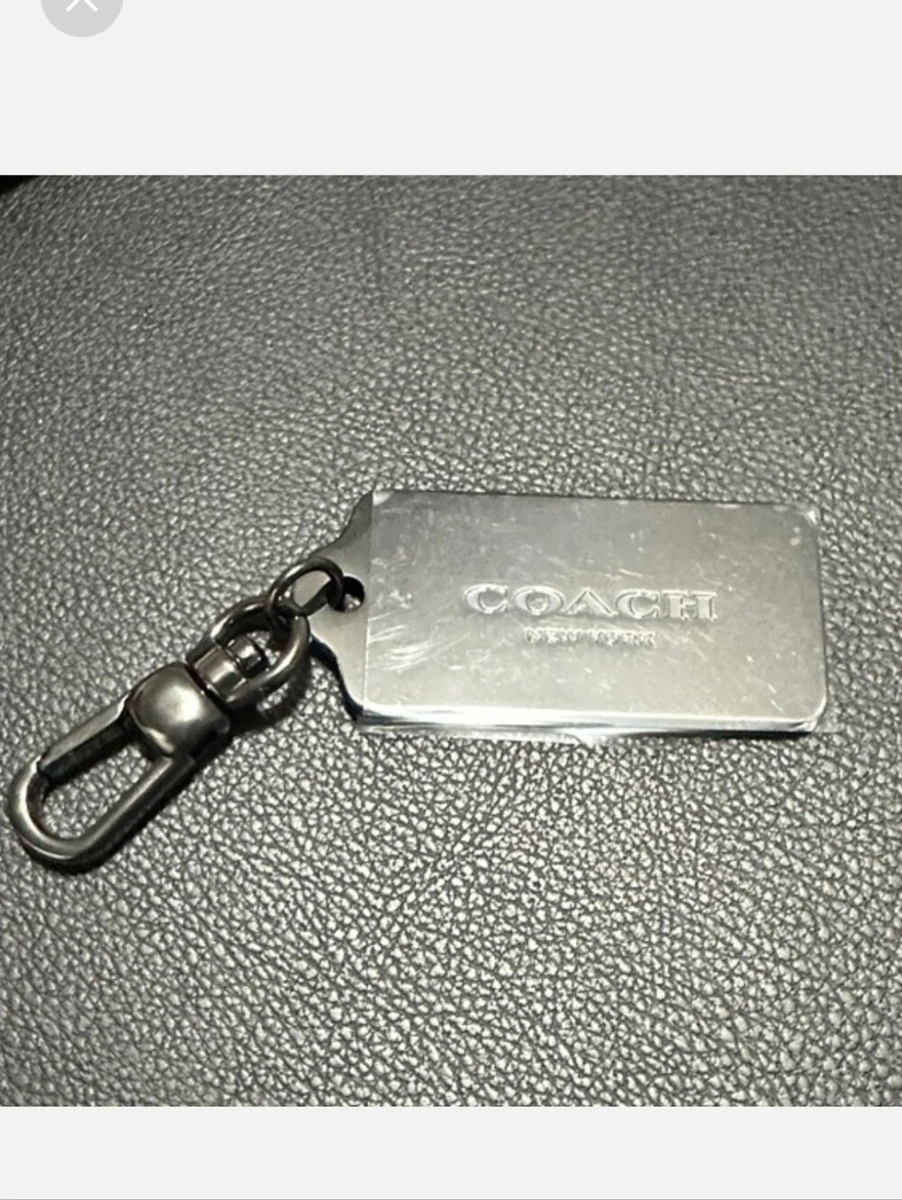Coach metal hang